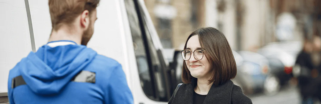smiling female customer looking at Lockmsith