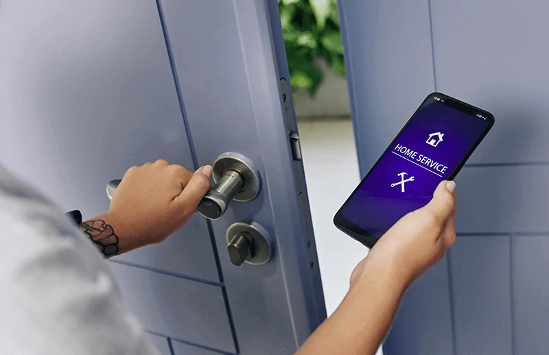 woman unlocking her smart lock using smart phone