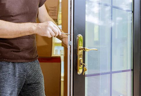 man fitting upvc glass door