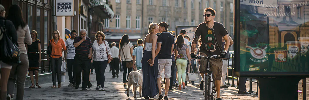 large crowd walking down the street