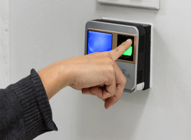 finger on a fingerprint scanner