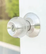 silver round door handle