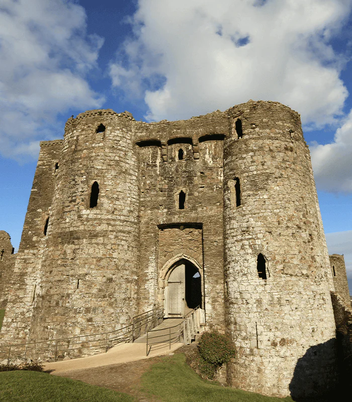 a castle with a walkway leading up to it